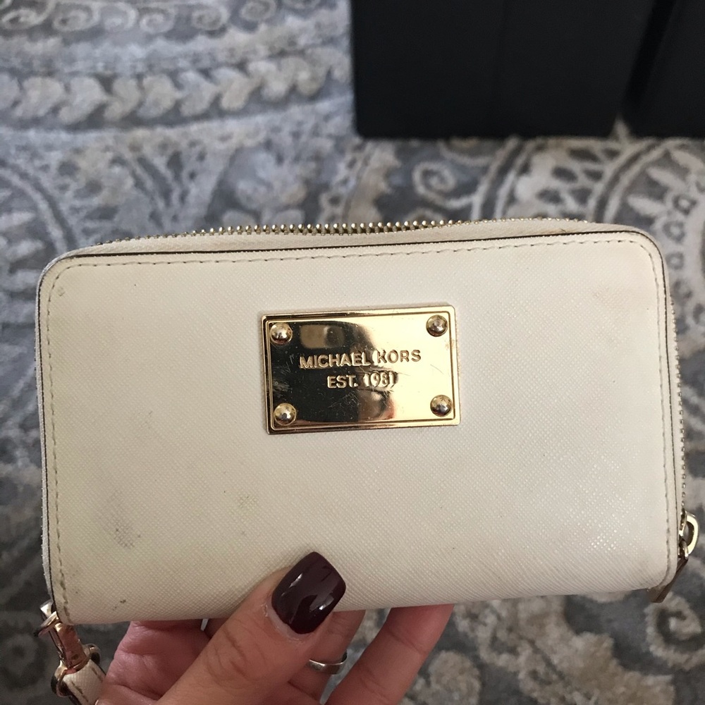 Michael Kors white wristlet/wallet